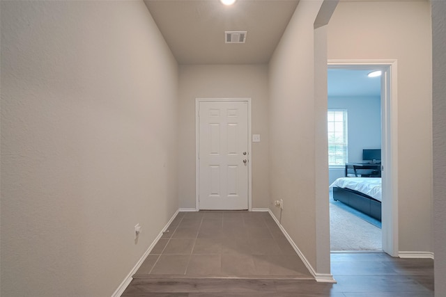 2535 Sandbar Shark Ct, Katy, TX 77449 - hallway with baseboards and tile patterned floors