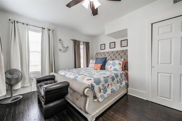 1414 Mechanic St, Galveston, TX 77550 - bedroom with dark wood-style flooring, ceiling fan, and baseboards