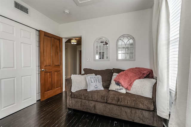 1414 Mechanic St, Galveston, TX 77550 - living area featuring dark wood-style flooring and plenty of natural light
