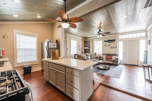 1414 Mechanic St, Galveston, TX 77550 - kitchen featuring wood ceiling, a ceiling fan, dark wood finished floors, light countertops, and gray cabinetry