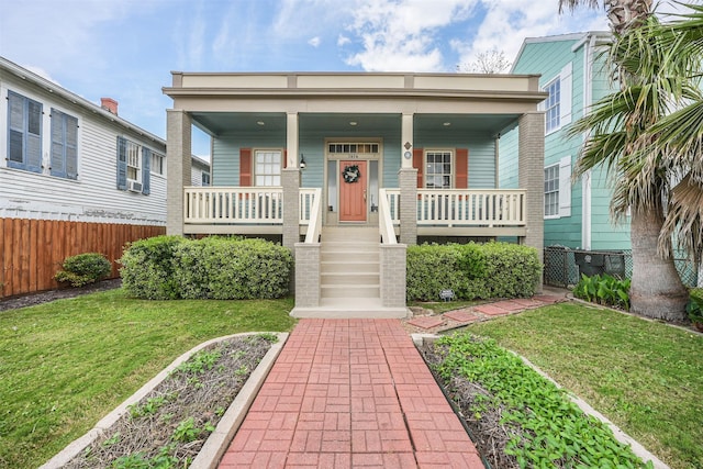 1414 Mechanic St, Galveston, TX 77550 - view of front of house with covered porch and stairway