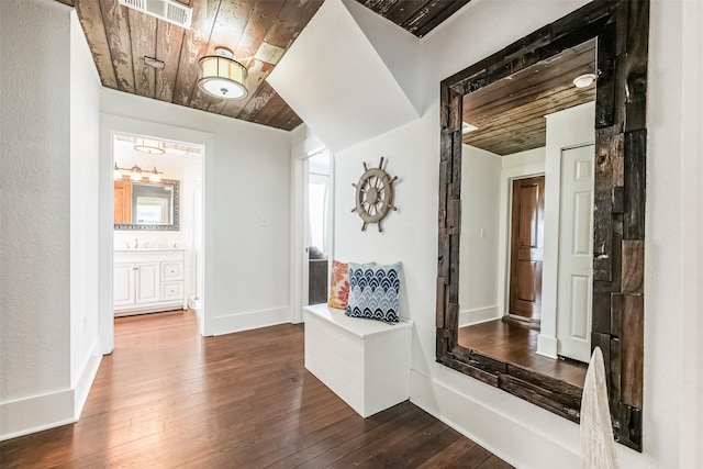 1414 Mechanic St, Galveston, TX 77550 - corridor with wood ceiling, dark wood finished floors, and baseboards