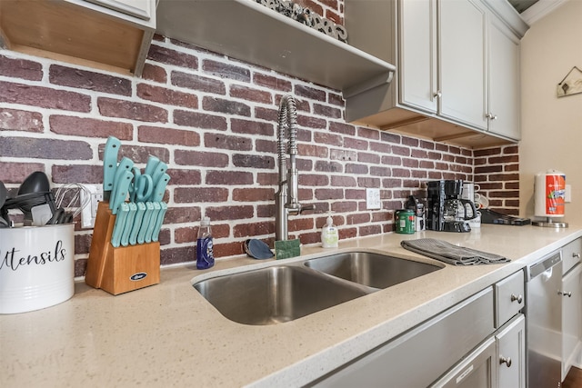 1414 Mechanic St, Galveston, TX 77550 - kitchen with a sink, dishwasher, light stone counters, and white cabinetry