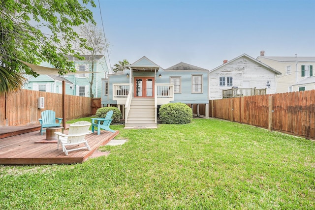 1414 Mechanic St, Galveston, TX 77550 - rear view of house featuring a deck and stairs
