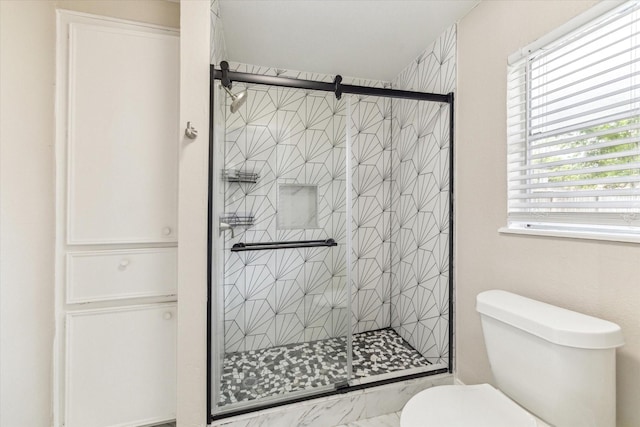 905 E 39th St, Houston, TX 77022 - bathroom featuring a stall shower and toilet