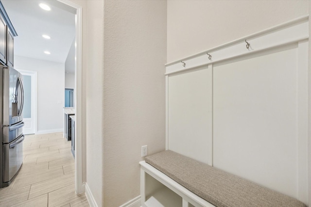 2314 Umber Oaks Ln, Brookshire, TX 77423 - mudroom featuring wood tiled floors, baseboards, and recessed lighting