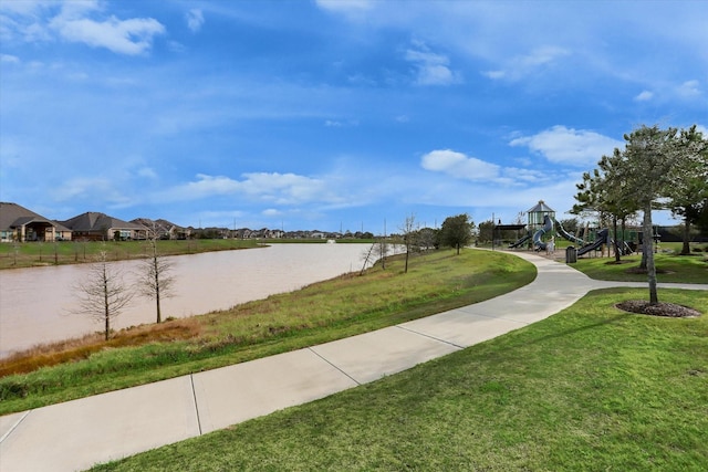 2314 Umber Oaks Ln, Brookshire, TX 77423 - view of home's community featuring a water view and a lawn