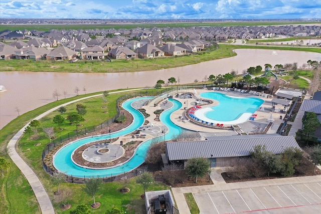 2314 Umber Oaks Ln, Brookshire, TX 77423 - view of property location featuring nearby suburban area, a large body of water, and a pool
