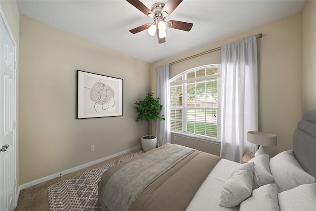 8727 Debbie Terrace Dr, Cypress, TX 77433 - bedroom featuring carpet, baseboards, and a ceiling fan