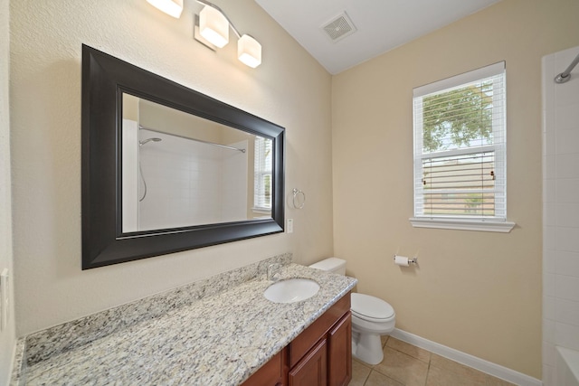 8727 Debbie Terrace Dr, Cypress, TX 77433 - full bath featuring toilet, vanity, tile patterned floors, and baseboards