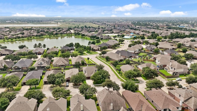 8727 Debbie Terrace Dr, Cypress, TX 77433 - aerial perspective of suburban area featuring a nearby body of water