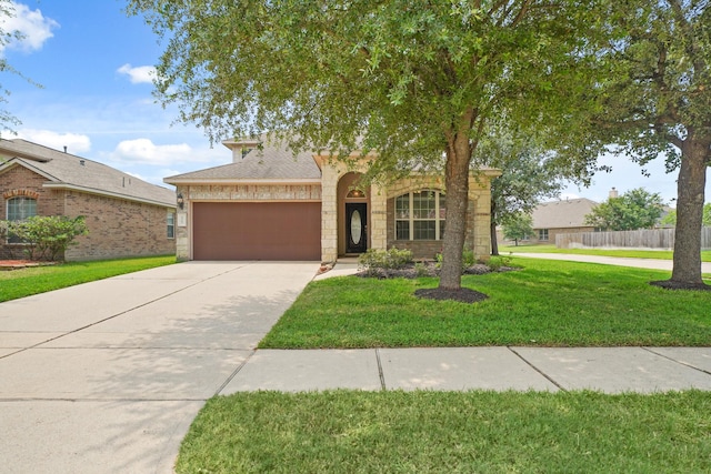 8727 Debbie Terrace Dr, Cypress, TX 77433 - view of front of property featuring a garage, concrete driveway, and stone siding