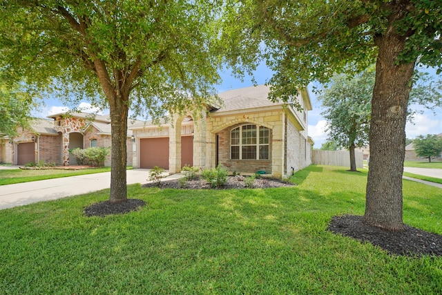 8727 Debbie Terrace Dr, Cypress, TX 77433 - view of front of home featuring an attached garage, driveway, stone siding, and a shingled roof