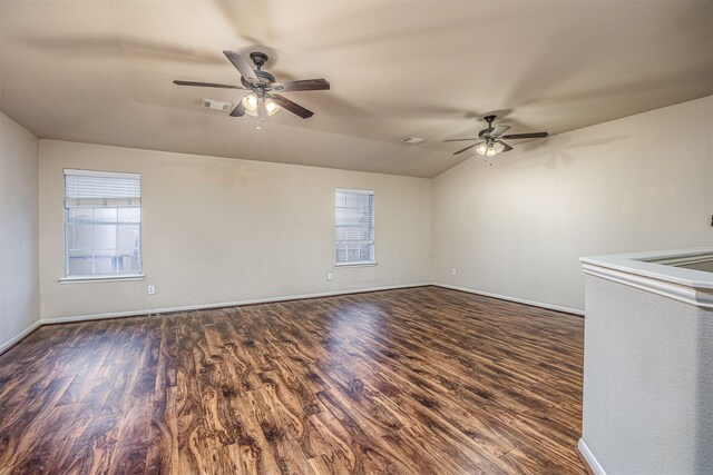 10611 Evergreen St, Baytown, TX 77523 - spare room with ceiling fan, dark wood-style floors, and baseboards