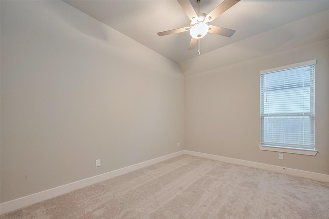 5106 Blooming Hibiscus Ln, Manvel, TX 77578 - empty room with light colored carpet, baseboards, a ceiling fan, and lofted ceiling