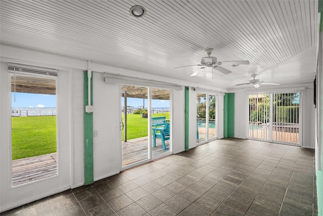 815 5th St, San Leon, TX 77539 - unfurnished room with ceiling fan and wood ceiling