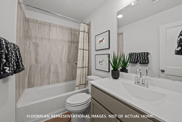8043 Kay Harbor Dr, Cypress, TX 77433 - bathroom featuring vanity, shower / tub combo, and toilet