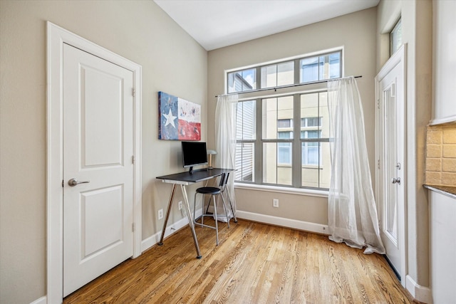 574 Bomar St, Houston, TX 77006 - office area with wood finished floors and baseboards
