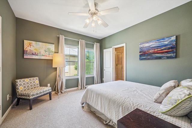 574 Bomar St, Houston, TX 77006 - carpeted bedroom with baseboards and ceiling fan