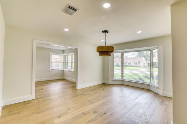 2519 Parana Dr, Houston, TX 77080 - spare room with plenty of natural light, baseboards, light wood-style floors, and recessed lighting