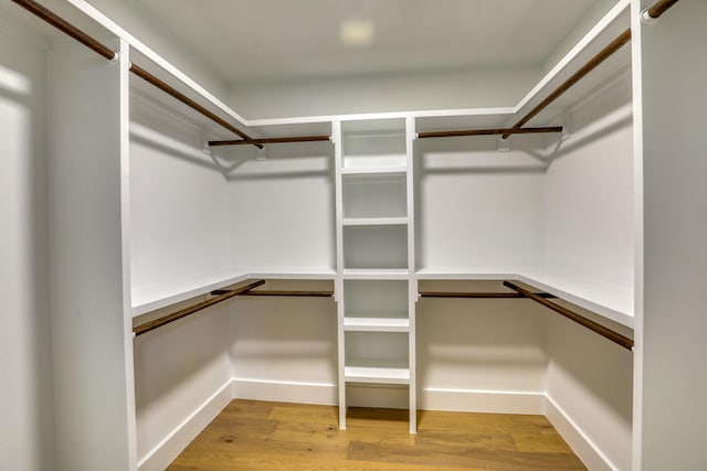2519 Parana Dr, Houston, TX 77080 - walk in closet featuring wood finished floors