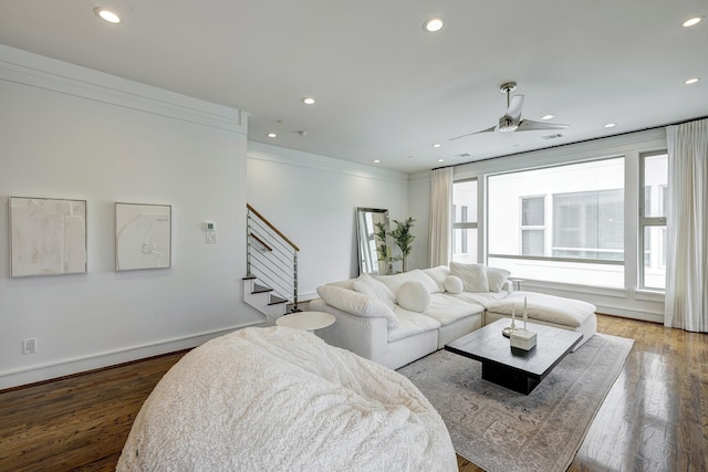 5317 Lillian St, Houston, TX 77007 - living room featuring stairway, recessed lighting, wood finished floors, baseboards, and ornamental molding