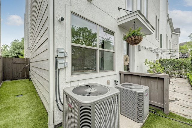 5317 Lillian St, Houston, TX 77007 - exterior view of cooling unit, a surveillance system, and a gate
