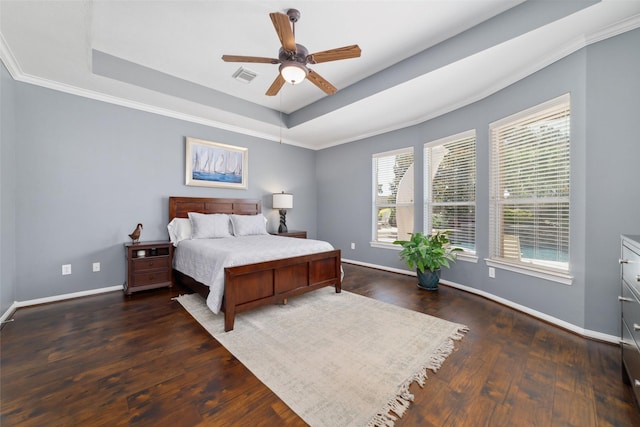 25303 Hall Meadow Ln, Katy, TX 77494 - bedroom with a raised ceiling, wood finished floors, baseboards, ornamental molding, and ceiling fan