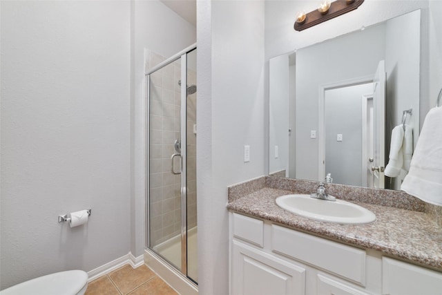 25303 Hall Meadow Ln, Katy, TX 77494 - bathroom with a stall shower, tile patterned floors, vanity, and toilet