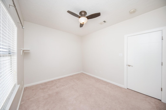 4311 Childress St, Houston, TX 77005 - spare room featuring a ceiling fan, carpet floors, a smoke detector, and baseboards