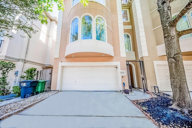 4311 Childress St, Houston, TX 77005 - property entrance featuring a garage and driveway