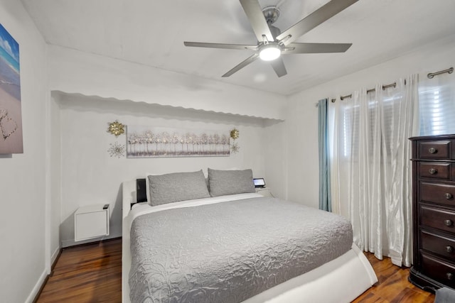 7310 Seawall Blvd Unit 309, Galveston, TX 77551 - bedroom featuring wood finished floors and a ceiling fan