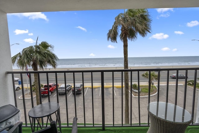7310 Seawall Blvd Unit 309, Galveston, TX 77551 - balcony with view of water and beach
