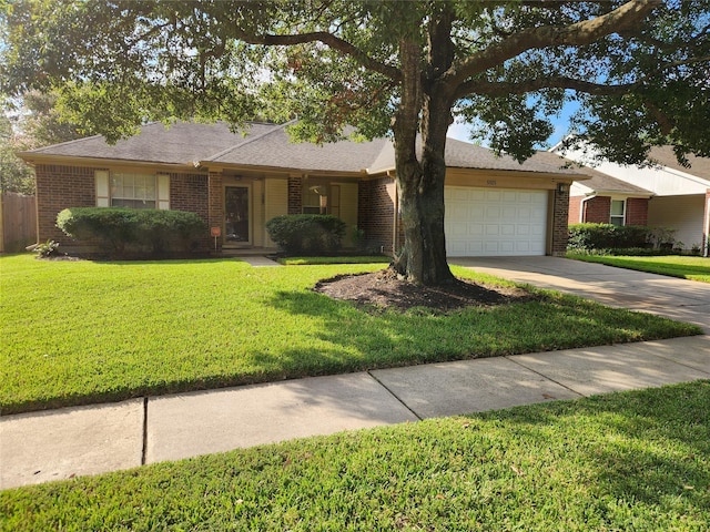 5515 Pimberton Ln, Spring, TX 77379 - ranch-style home featuring driveway, a garage, brick siding, and a front yard