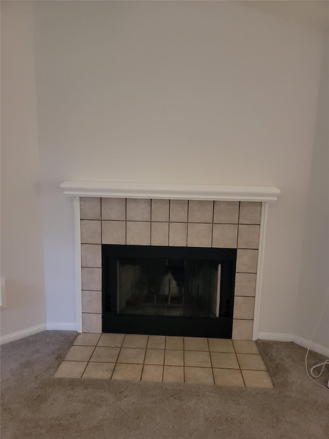 5515 Pimberton Ln, Spring, TX 77379 - detailed view of a tile fireplace, carpet floors, and baseboards