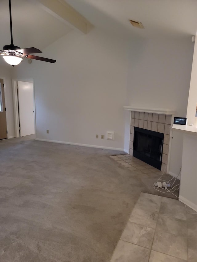 5515 Pimberton Ln, Spring, TX 77379 - unfurnished living room with a ceiling fan, a tile fireplace, baseboards, and carpet flooring