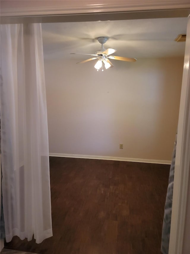 5515 Pimberton Ln, Spring, TX 77379 - spare room featuring a ceiling fan, baseboards, and dark wood finished floors