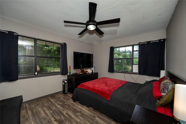 1933 Fm 1272, Grapeland, TX 75844 - bedroom featuring wood finished floors, baseboards, and a ceiling fan
