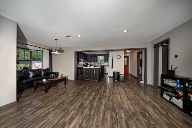 1933 Fm 1272, Grapeland, TX 75844 - living area with dark wood-type flooring, baseboards, and recessed lighting