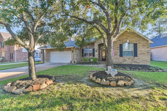 12202 Salt River Valley Ln, Humble, TX 77346 - view of front of property with concrete driveway, a front yard, brick siding, and a garage