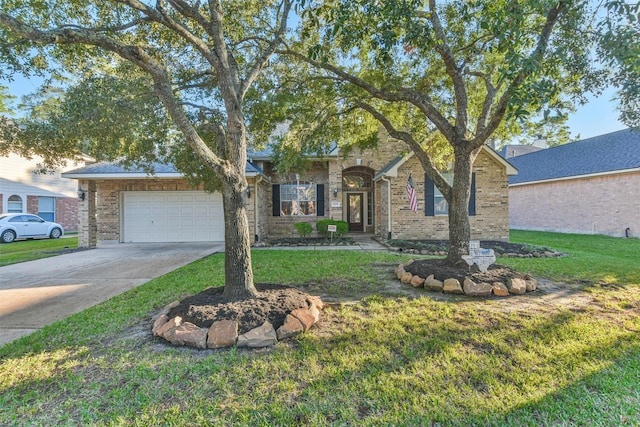 12202 Salt River Valley Ln, Humble, TX 77346 - view of front of home with a front lawn, concrete driveway, a garage, and brick siding
