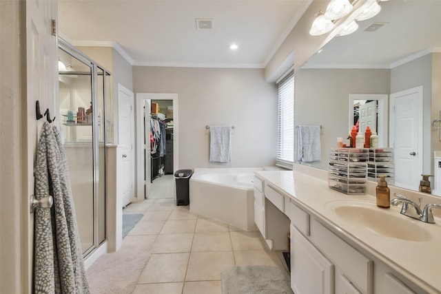 12202 Salt River Valley Ln, Humble, TX 77346 - full bathroom with vanity, tile patterned flooring, a shower stall, a bath, and a spacious closet
