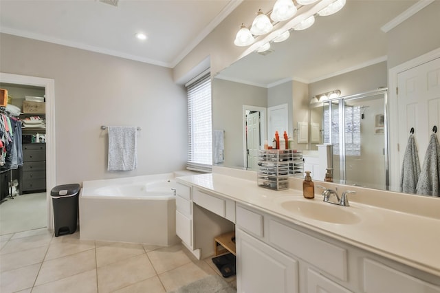 12202 Salt River Valley Ln, Humble, TX 77346 - full bath featuring vanity, a shower stall, a garden tub, ornamental molding, and a walk in closet