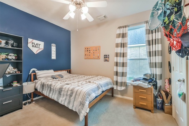 12202 Salt River Valley Ln, Humble, TX 77346 - bedroom featuring light carpet, baseboards, and ceiling fan