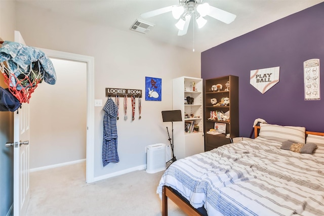 12202 Salt River Valley Ln, Humble, TX 77346 - carpeted bedroom with baseboards and a ceiling fan