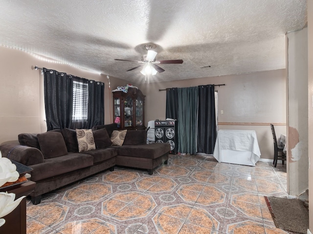 14914 Lawther St, Channelview, TX 77530 - living area featuring a textured ceiling and a ceiling fan