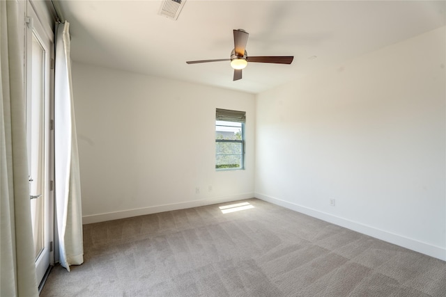11502 Royal Tower Pl, Houston, TX 77082 - spare room with light colored carpet, baseboards, and ceiling fan