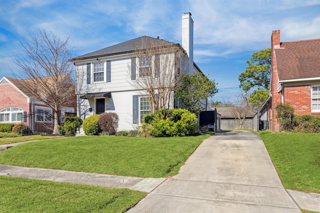 6649 Fairfield St, Houston, TX 77023 - view of front of property with a front yard, driveway, and a gate