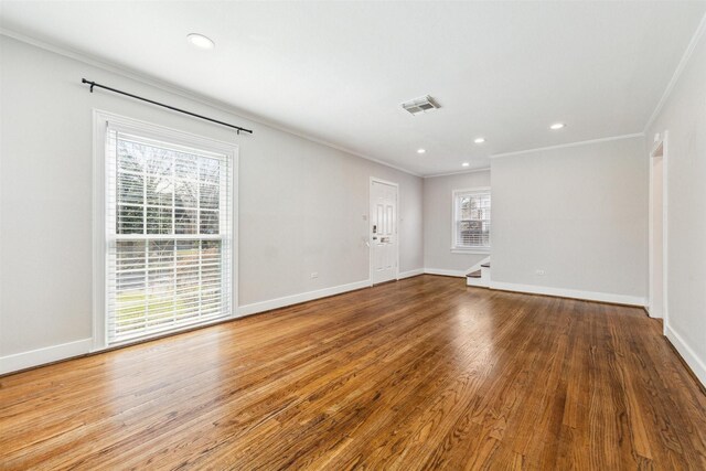 6649 Fairfield St, Houston, TX 77023 - empty room featuring ornamental molding, wood finished floors, baseboards, and recessed lighting
