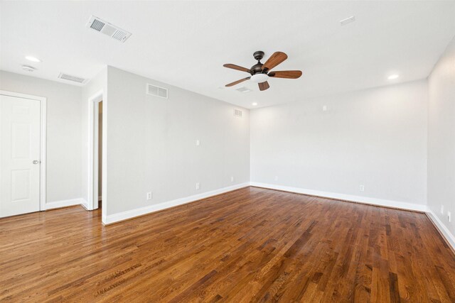 6649 Fairfield St, Houston, TX 77023 - empty room featuring ceiling fan, wood finished floors, baseboards, and recessed lighting